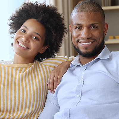 Young couple sitting on a couch